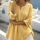 Blouse pour femme à manches longues, col Henley et détails plissés